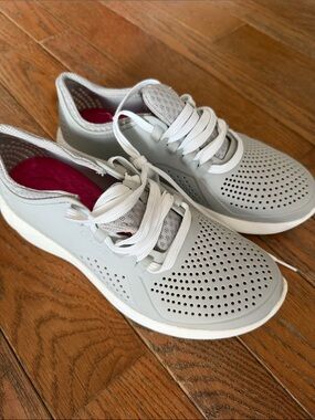 CROCS Women's Perforated Lace-Up Water Sneakers in Light Gray with Pink Insoles